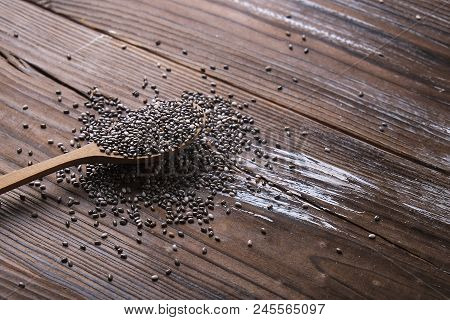 Minimalistic Composition With Chia Seeds On Table. Healthy Nutritious Food.