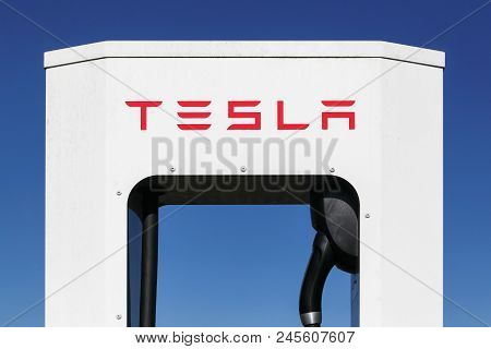 Hedensted, Denmark - May 5, 2018: Tesla Supercharger Station. Tesla Is An American Automotive And En