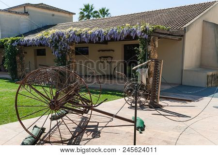 Metal Farm Implements On A Farm In South Italy