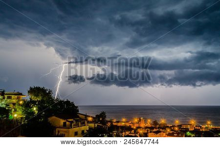 Scenic Lightning Over The Sea At Night