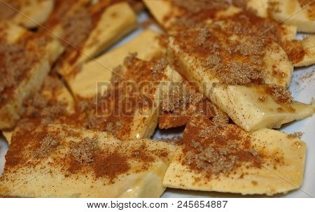 Cut Plantain Cooking Bananas Sprinkled With Cinamon And Brown Sugar