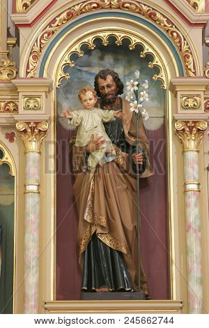 SISAK, CROATIA - DECEMBER 07: Statue of Saint Joseph in the Church of Holy Cross in Sisak, Croatia, on December 07, 2017.
