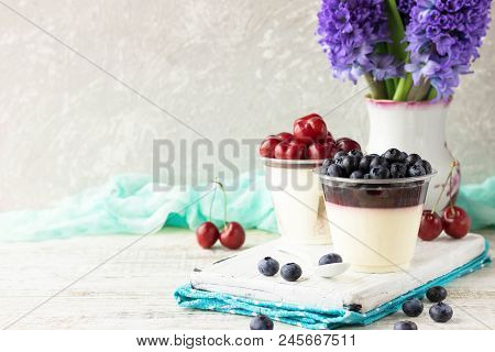 Italian Dessert Pana Cota With Berry Jam And Fresh Blueberries