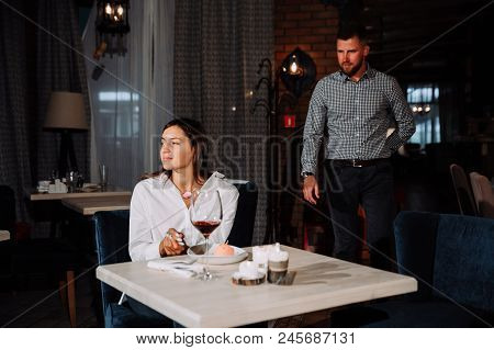 A Beautiful Girl Is Waiting For A Guy On A Date.people, Surprise And Dating Concept - Happy Couple D