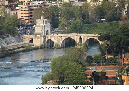 Milvio Bridge Over The Tiber River In Rome, Italy