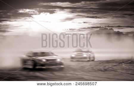 Car Battle Drifting, Blurred Of Image Diffusion Race Drift Car With Lots Of Smoke From Burning Tires