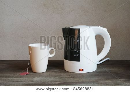 Tea Making Facilities With Electric Water Kettle, Teacup And Teabag
