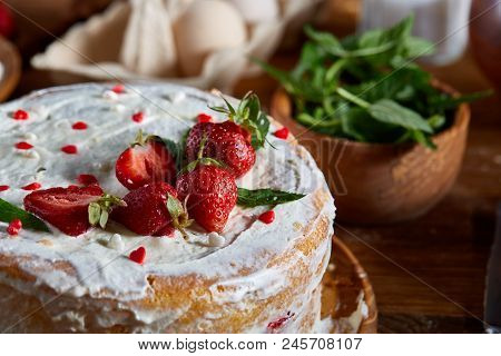 Strawberry Tart Covered With Whipped Sour Cream On A Wooden Tray Over Rustic Background, Close-up, S