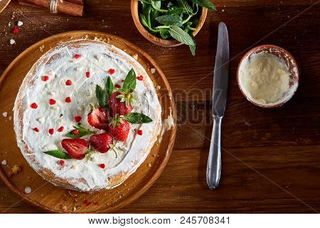 Strawberry Tart Covered With Whipped Sour Cream On A Wooden Tray Over Rustic Background, Close-up, S