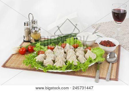 Kinkali In Green With Tomatoes And Onions. Serve With Soy Sauce And Sour Cream.