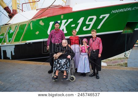 Urk, Netherlands - May 19, 2018: People In Traditional Costumes On The Urkerdays. Urk Is On Of The B
