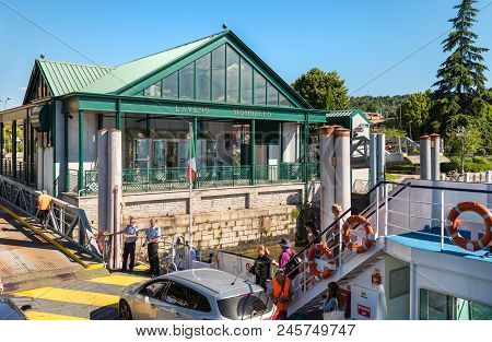 Laveno Mombello, Varese, Italy - June 14, 2018: Boarding Place On The Ferries With Ferry And Ticket 