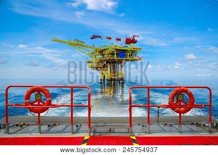 Offshore Construction Platform For Production Oil And Gas. Oil And Gas Industry And Hard Work. Produ