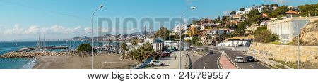 Malaga, Spain - December 23, 2017. Candado Beach And Nautical Center Enasol With The Malaga Town In 