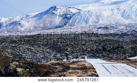 Tourist Girl With Icealnd Snow Mountain Volcanice Landscape