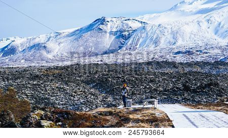 Tourist Walk In Iceland Volcanic Landscape Moutnian Background