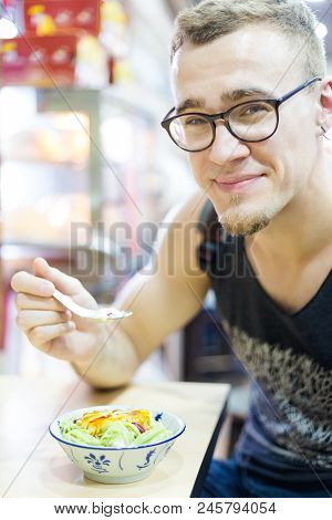 Young Tourist Eating Cendol Ais Kachang Dessert In Mallaca City. Traditional Shaved Ice Snack Of Mal