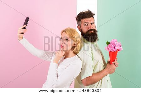 Sharing Happy Selfie. Woman Capturing Happy Moment Boyfriend Bring Bouquet Flowers. Capturing Moment