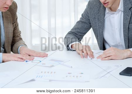 Business Men Making Paper Planes At The Meeting Table. Idleness. Childish  Behavior At Work