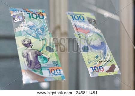 ST. PETERSBURG, RUSSIA - MAY 23, 2018: Commemorative 100 rubles banknotes for FIFA World Cup Russia 2018 exposed in the exhibition 