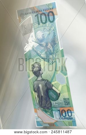 ST. PETERSBURG, RUSSIA - MAY 23, 2018: Commemorative 100 rubles banknote for FIFA World Cup Russia 2018 exposed in the exhibition 