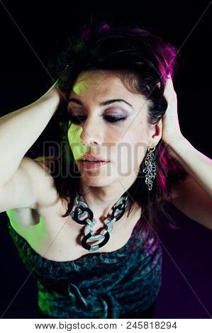 Young Caucasian Brunette Dancing. Top View. Studio Shot