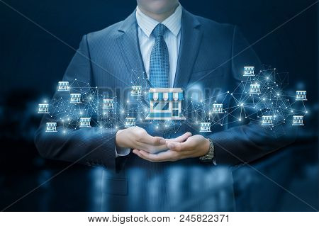 Franchise System In The Hands Of A Businessman.