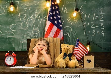 Happy Students At The Lesson With Usa National Flag. Enrichment Classes Can Be Difficult For Some Ki