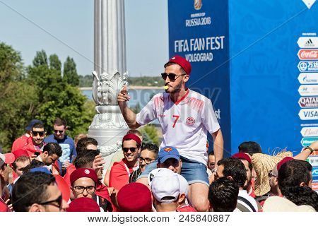 Football Fans Of The National Team Of Tunisia With National Flags And Attributes In Fanzone Fanfesta