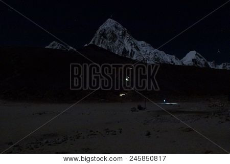 Trekkers With Headlights In The Dark Climbing Kala Patthar, Gorak Shep, Everest Base Camp Trek, Nepa