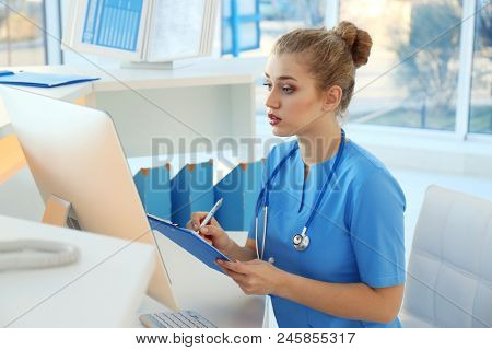 Female receptionist working in hospital