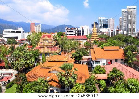 Aerial view on Pulau Tikus, thai Buddhist temple (Wat Chayamangkalaram) and Georgetown, Penang island, Malaysia