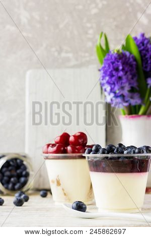 Italian Dessert Pana Cota With Berry Jam And Fresh Blueberries