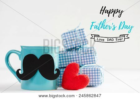 Happy Fathers Day Concept. Stack Of Beautiful Gift Box With Handmane Red Heart, Mustache And Bow Tie