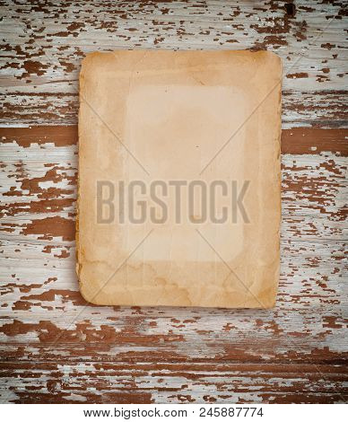 Old Sheet Of Paper On The Wall