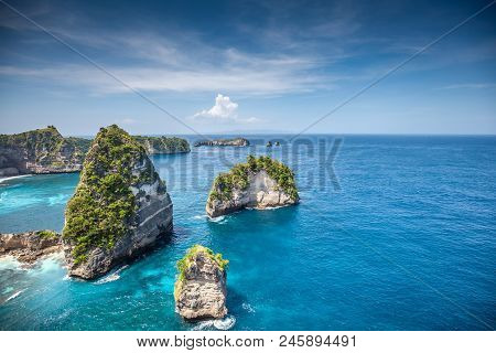Aerial View Of The Small Island Of Nusa Batumategan And Nusa Batupadasan Island From The Atuh Rija L