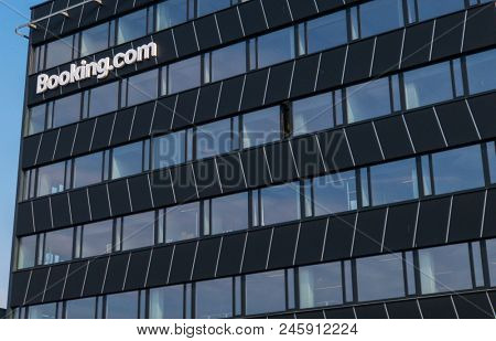 Vilnius, Lithuania - May 3, 2018: Booking.com sign on the facade of office building