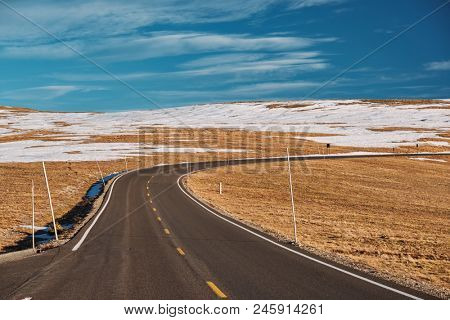 Trail Ridge Road, the highest (12,183 feet) continuous highway in the USA in high alpine tundra with rocks and mountains at autumn. Rocky Mountain National Park in Colorado, USA. 