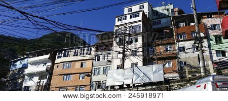 Rocinha Community, Lots Of People, Lots Of Houses, Shops.
Rio De Janeiro, Brazil South America