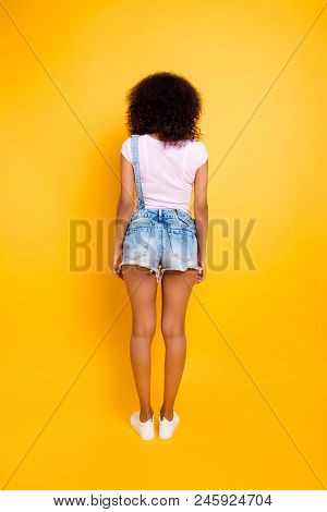 Fullbody Shot Rear View Portrait Of Pretty Charming Girl In White T-shirt Jeans Jumpsuit Shoes With 
