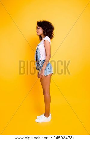 Full Body Shot Profile Half-face Portrait Of Pretty Charming Girl In White T-shirt Jeans Jumpsuit Wi