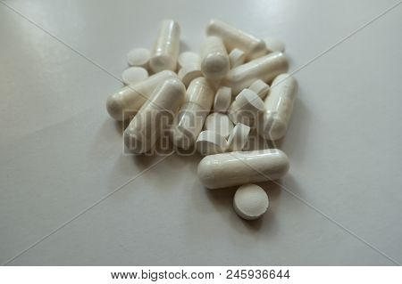 Cellulose Magnesium Citrate Capsules And Vitamin K2 Tablets In A Heap