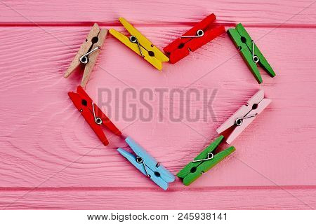 Colorful Clothespins Forming Shape Of Heart. Colorful Valentines Day Hearts Made From Different Colo