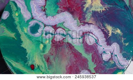 Painted Round Canvas In Green In Fluid Art Style