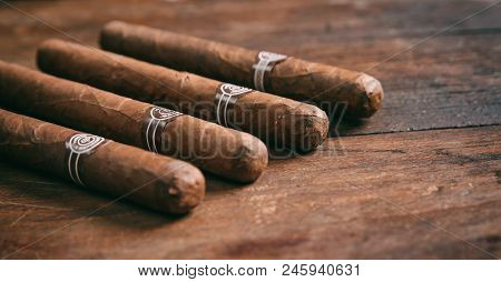 Cigars On Wooden Background, Copy Space