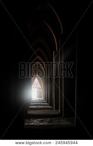Djenne, Mali - Circa August 2009 - Light At The End Of A Tunnel, Typical Muslin Mosque At Sunset