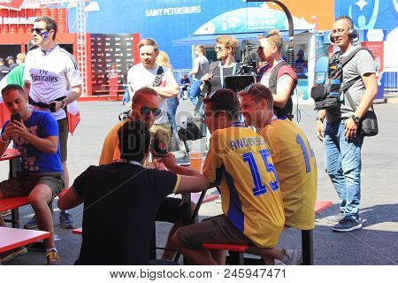 St. Petersburg, Russia - June 18, 2018: Journalist Interviewing Swedish Fans At Fifa World Cup Fan Z