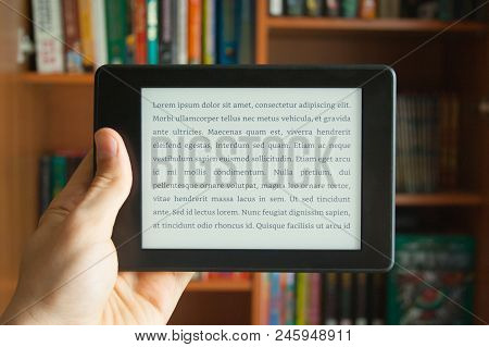 E-book In Man's Hand With Lorem Ipsum Text