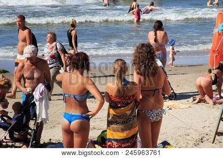 Zelenogradsk, Kaliningrad Region, Russia - July 29, 2017: Unknown People Resting On A Sandy Beach On