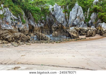 the famous beach gulpiyuri, in Asturias, Spain